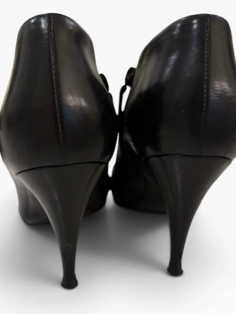 CHANEL Black Leather Ankle Boots with Silver Cap Toe Logo